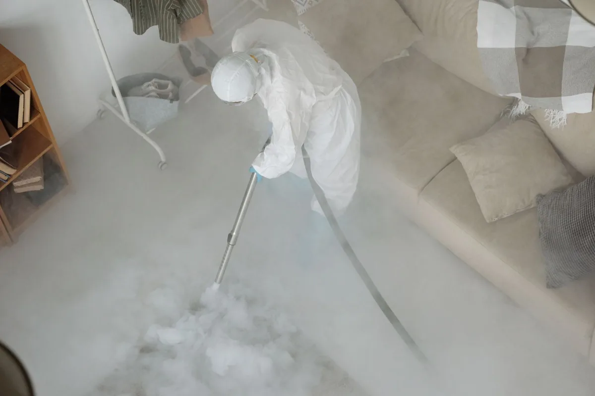 Biohazard cleanup technician in protective equipment, Berea, SC